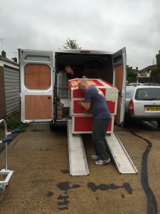 6090 laser big red being unloaded