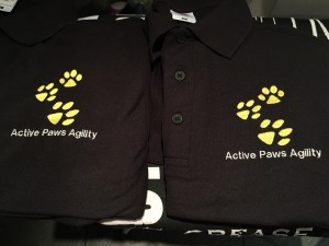 Embroidered polo shirt paw prints